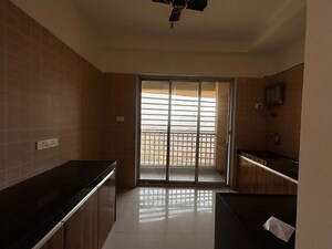 Kitchen in 2 BHK Apartment at Anant Metropolis Insignia Towers, Kasarvadavali – for Rent