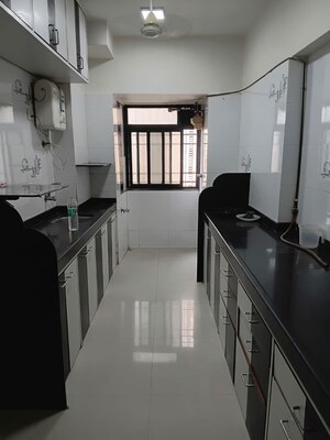 Kitchen in 2 BHK Apartment at Lokhandwala Whispering Palms, Kandivali East – for Rent