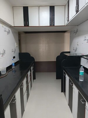 Kitchen in 2 BHK Apartment at Lokhandwala Whispering Palms, Kandivali East – for Rent