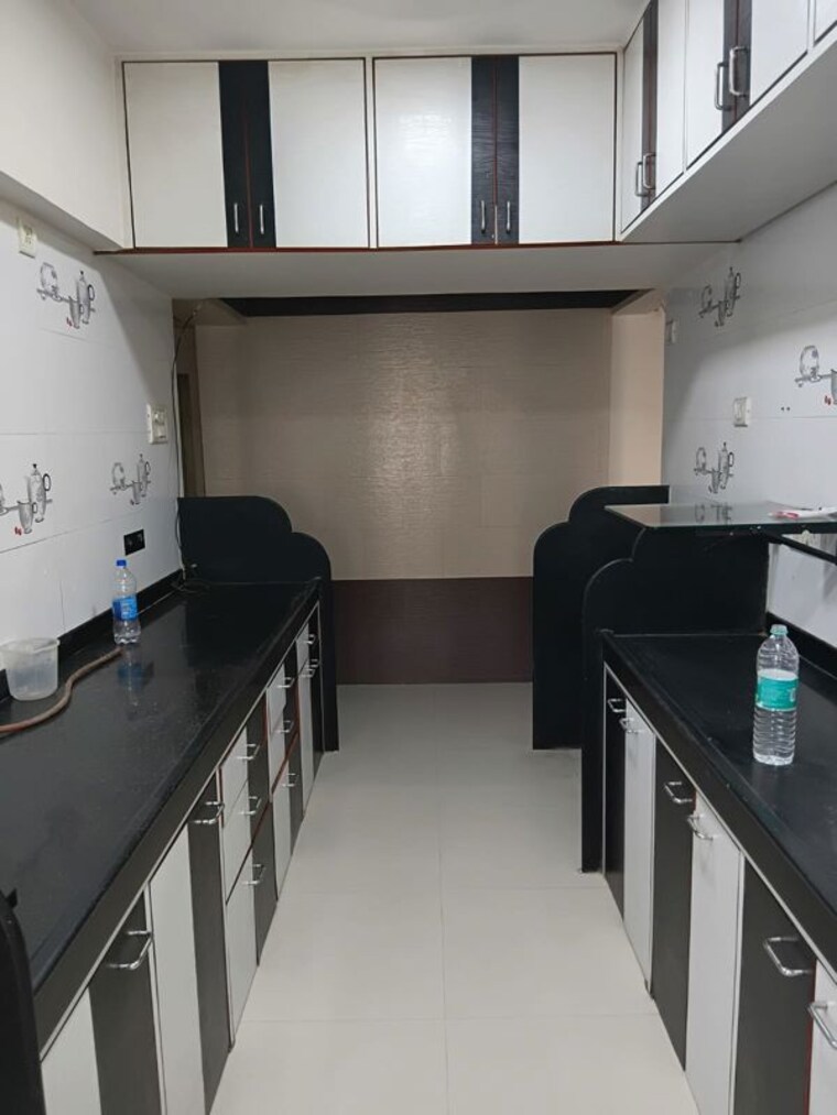 Kitchen, lokhandwala-whispering-palms 2 Bedroom 700 Sq.Ft. Apartment In Kandivali East Mumbai 10336514