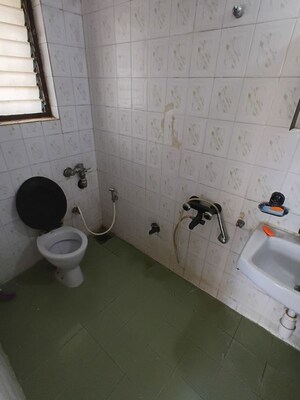 Bathroom in 3 BHK Apartment at Lokhandwala Whispering Palms, Kandivali East – for Rent