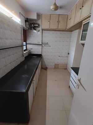 Kitchen in 3 BHK Apartment at Lokhandwala Whispering Palms, Kandivali East – for Rent