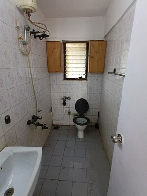 Bathroom in 3 BHK Apartment at Lokhandwala Whispering Palms, Kandivali East – for Rent