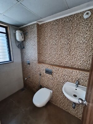 Bathroom in 1 BHK Apartment at Lodha Downtown, Dombivli East – for Rent