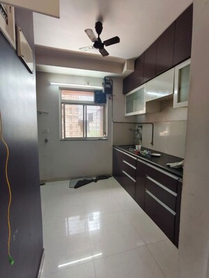 Kitchen in 1 BHK Apartment at Puranik City, Kasarvadavali – for Rent