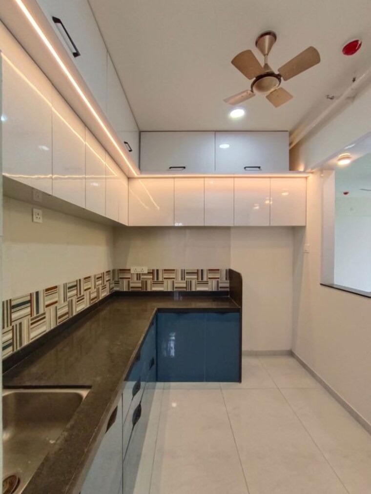 Kitchen, mantra-meraki 3 Bedroom 1400 Sq.Ft. Apartment In Akurdi Pune 10330522