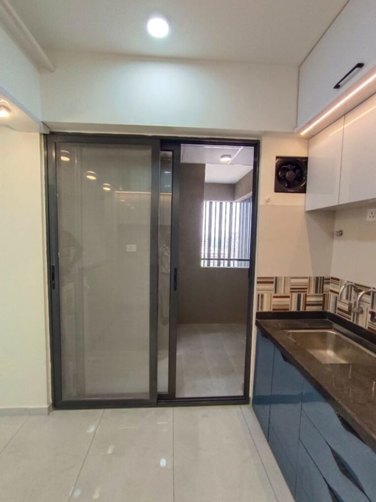 Kitchen, mantra-meraki 3 Bedroom 1400 Sq.Ft. Apartment In Akurdi Pune 10330522