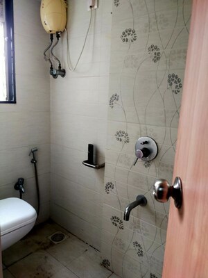 Bathroom in 2 BHK Apartment at Arco Arcade, Vile Parle East – for Rent