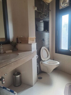 Bathroom in 3 BHK Apartment at Panchsheel Enclave – for Rent