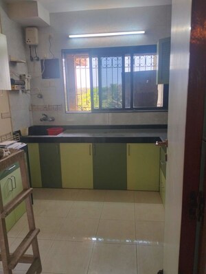 Kitchen in 3 BHK Apartment at Samartha Meghdoot Apartment, Andheri West – for Rent