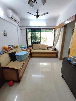 Living Room in 2 BHK Apartment at Emgee Apartment, Wadala – for Rent