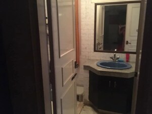 Bathroom in 3 BHK Apartment at Crestwood Apartment, Sector 47 – for Rent