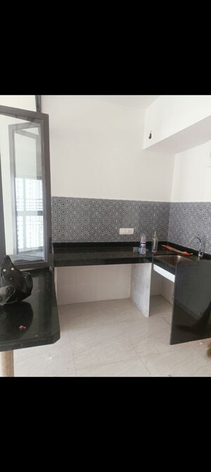 Kitchen in 1 BHK Apartment at Lodha Crown Quality Homes, Majiwada – for Sale