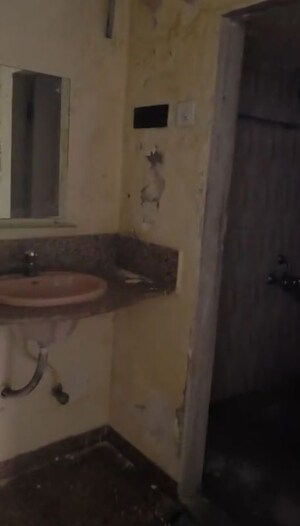 Bathroom in 2 BHK Apartment at Mangal Shantinagar CHS, Mira Road – for Rent