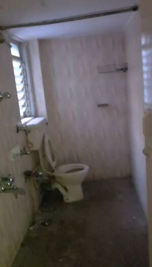 Bathroom in 2 BHK Apartment at Mangal Shantinagar CHS, Mira Road – for Rent