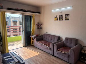 Living Room in 2 BHK Apartment at RK Lunkad Nisarg Nirman, Pimple Saudagar – for Rent