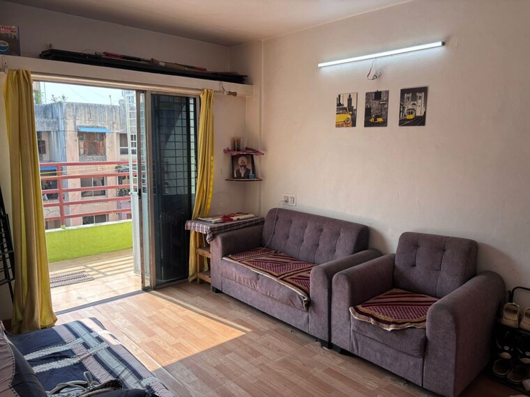 Living Room, rk-lunkad-nisarg-nirman 2 Bedroom 850 Sq.Ft. Apartment In Pimple Saudagar Pune 10336938