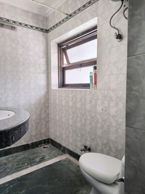 Bathroom in 2 BHK Builder Floor at Green Park Extension – for Rent