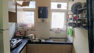Kitchen in 2 BHK Apartment at Adarsh Nagar – for Sale