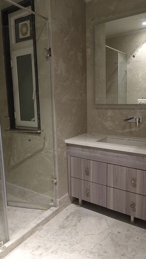 Bathroom in 3 BHK Builder Floor at New Rajinder Nagar – for Sale