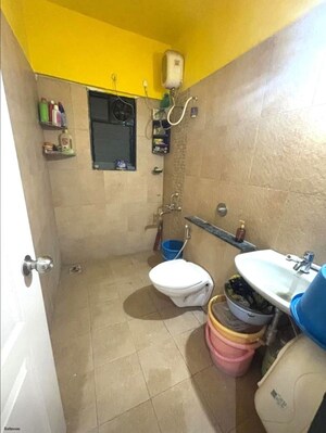 Bathroom in 2 BHK Apartment at Anshul Kanvas, Wagholi – for Rent