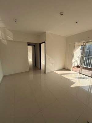 Living Room in 2 BHK Apartment at Lodha Amara, Kolshet Road – for Sale