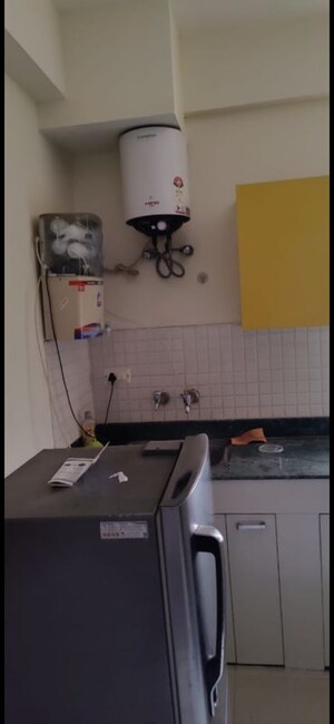 Kitchen in 2 BHK Apartment at Breez Global Heights, Sohna Sector 33 – for Rent