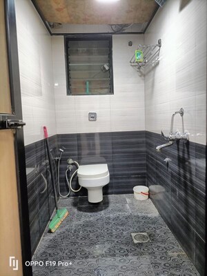 Bathroom in 2 BHK Apartment at Upvan Tower, Malad East – for Rent