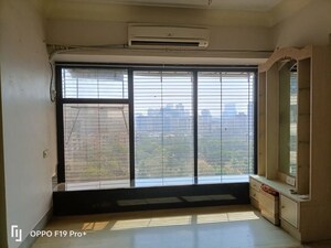Bedroom in 2 BHK Apartment at Upvan Tower, Malad East – for Rent