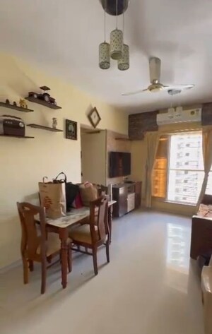 Living Room in 1 BHK Apartment at Unique Signature Mumbai, Mira Road – for Sale
