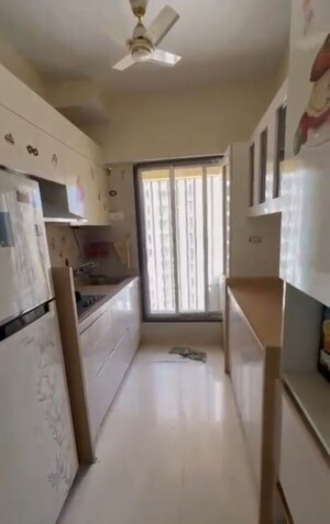 Kitchen in 1 BHK Apartment at Unique Signature Mumbai, Mira Road – for Sale