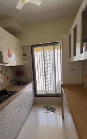 Kitchen in 1 BHK Apartment at Unique Signature Mumbai, Mira Road – for Sale