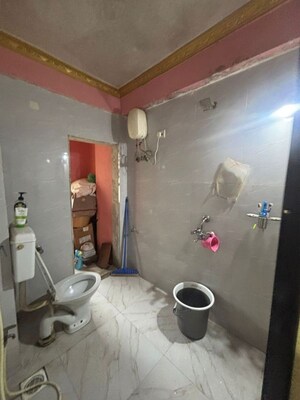 Bathroom in 2 BHK Apartment at Tilak Nagar Building, Tilak Nagar – for Rent