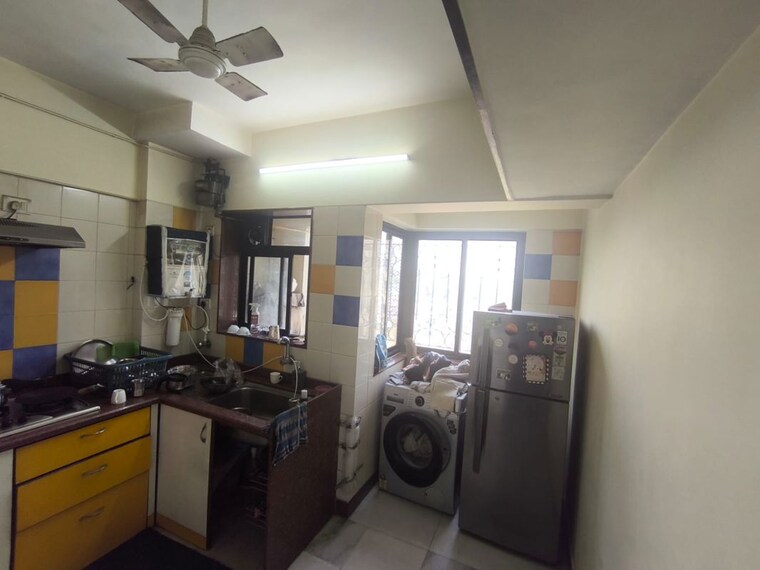 Kitchen, vikash-complex-chs 2 Bedroom 800 Sq.Ft. Apartment In Uthalsar Thane 10337390