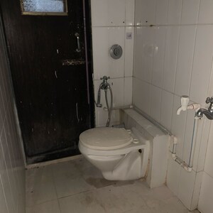 Bathroom in 2 BHK Apartment at Tulsibaug CHS, Prem Nagar – for Rent