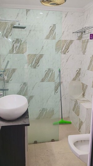 Bathroom in 3 BHK Apartment at Sector 6 Dwarka – for Rent