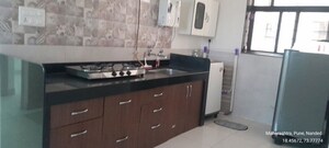 Kitchen in 2 BHK Apartment at Nanded Bageshree, Sinhagad Road – for Rent