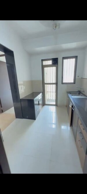 Kitchen in 2 BHK Apartment at Lodha Luxuria, Majiwada – for Rent