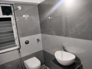 Bathroom in 3 BHK Apartment at Aastha Heights, Goregaon West – for Rent