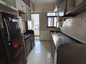 Kitchen in 2 BHK Apartment at Narayan Peth – for Rent