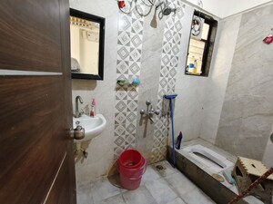 Bathroom in 2 BHK Apartment at Narayan Peth – for Rent