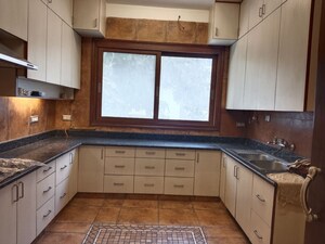 Kitchen in 4 BHK Apartment at Vasant Vihar – for Rent