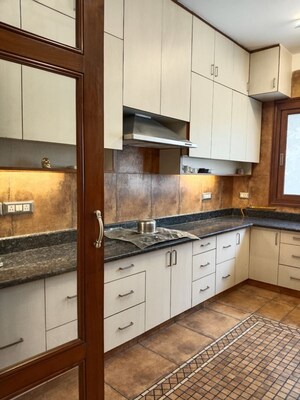 Kitchen in 4 BHK Apartment at Vasant Vihar – for Rent