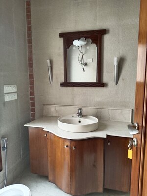 Bathroom in 4 BHK Apartment at Vasant Vihar – for Rent