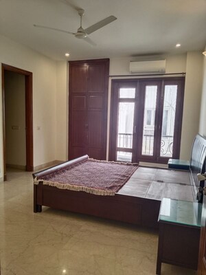 Bedroom in 4 BHK Apartment at Vasant Vihar – for Rent