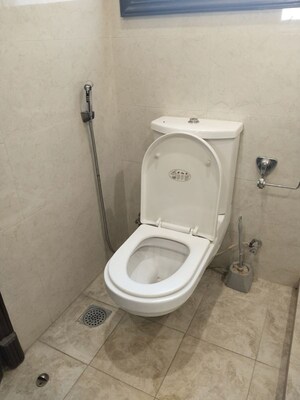 Bathroom in 4 BHK Apartment at Vasant Vihar – for Rent