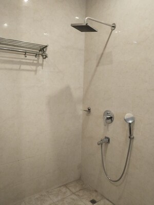 Bathroom in 4 BHK Apartment at Vasant Vihar – for Rent