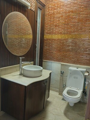 Bathroom in 4 BHK Apartment at Vasant Vihar – for Rent