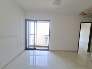 Living Room in 2 BHK Apartment at Runwal Eirene, Balkum Pada – for Rent