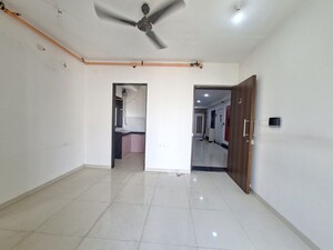 Living Room in 2 BHK Apartment at Runwal Eirene, Balkum Pada – for Rent